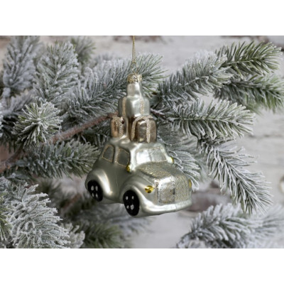 Julepynt bil med gaver på taget.