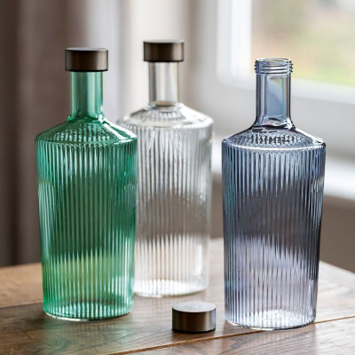 Paveau glas vandflaske i låg i den grønne farve Bondi.