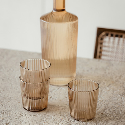 Paveau vandflaske i glas med låg i farven Bells.