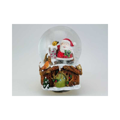 Spilledåse med julemand, sne og musik.