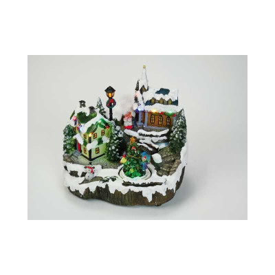 Spilledåse med by, juletræ og julemusik.