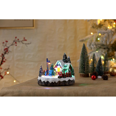 Spilledåse med juletræ og julemusik.