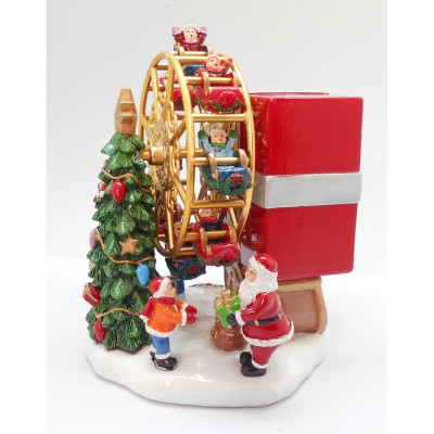 Spilledåse. Pariserhjul med julemand og juletræ.